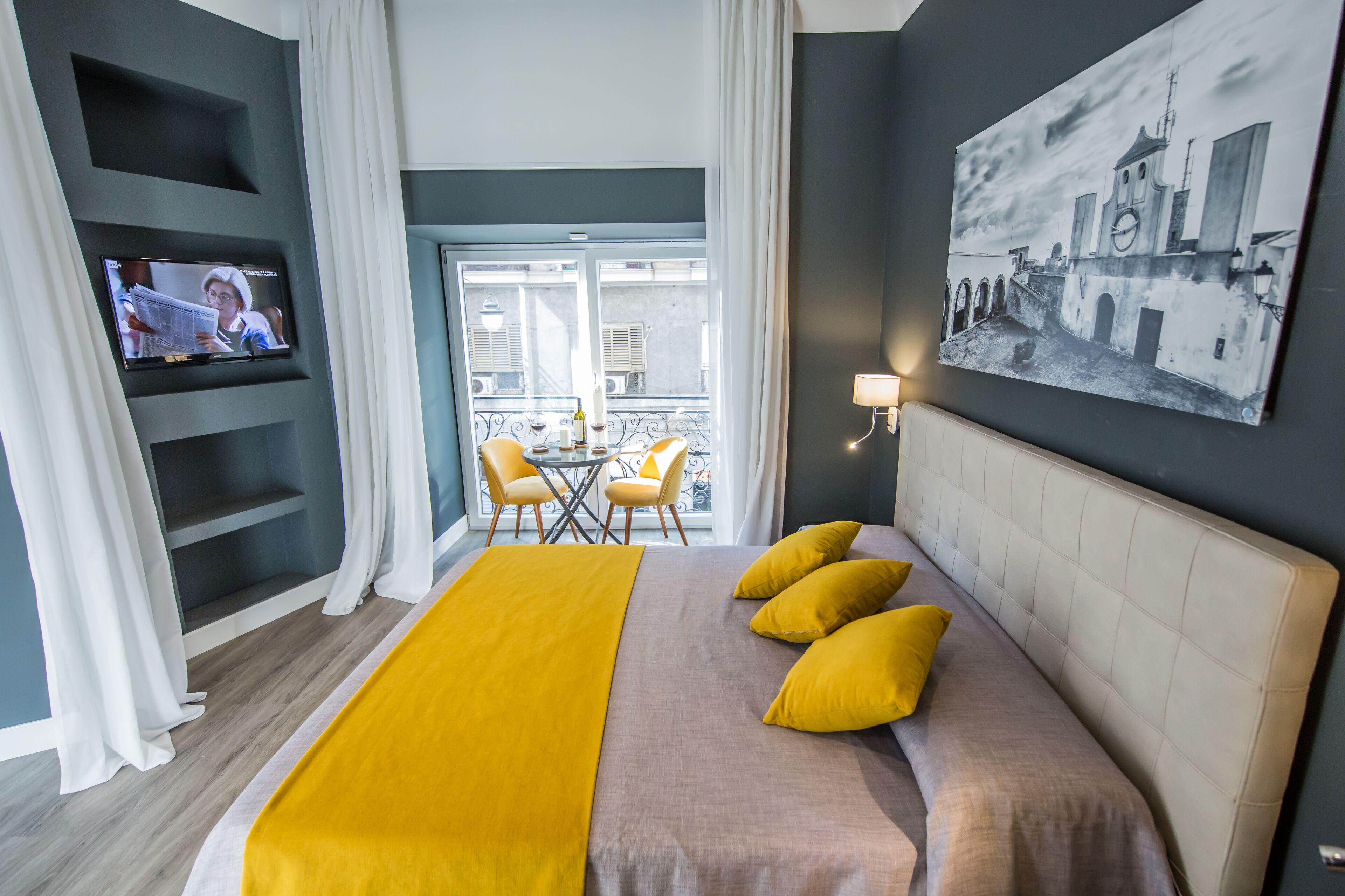 Deluxe kamer | Luxe beddengoed, een kluis op de kamer, individueel gemeubileerd