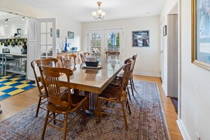 Dining - The Blue Moon House has 5 bedrooms, each with a private bath, plus kitchen, dining and living area. (Ashland)