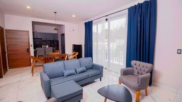 Suite ejecutiva, 1 habitación | Área de sala de estar
