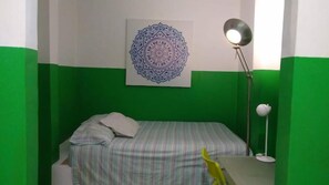 Laptop workspace, iron/ironing board, free WiFi, bed sheets