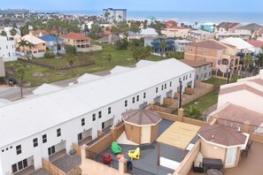 Exterior - Coastal Townhouse with Rooftop Deck, Pool & Ocean Views! Steps to Beach! (South Padre Island)