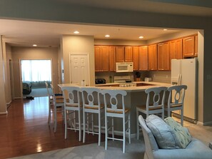 Main Level Kitchen, Breakfast BarEntry and Primary Suite from Great Room - Beach & Golf Getaway w/ Four Bedrooms on Three Levels - Living Areas All Levels (Ocean Pines)