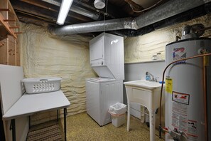 Shower, hair dryer, towels, toilet paper