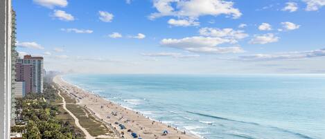 On the beach, sun loungers