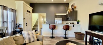 Centralia home minutes to NW Sports Hub. Modern two bedroom - primary ensuite. Main level bedroom with full bathroom adjacent. Full kitchen. Fully fenced backyard with covered patio. In home laundry - full size washer/dryer. Parking - 4 cars