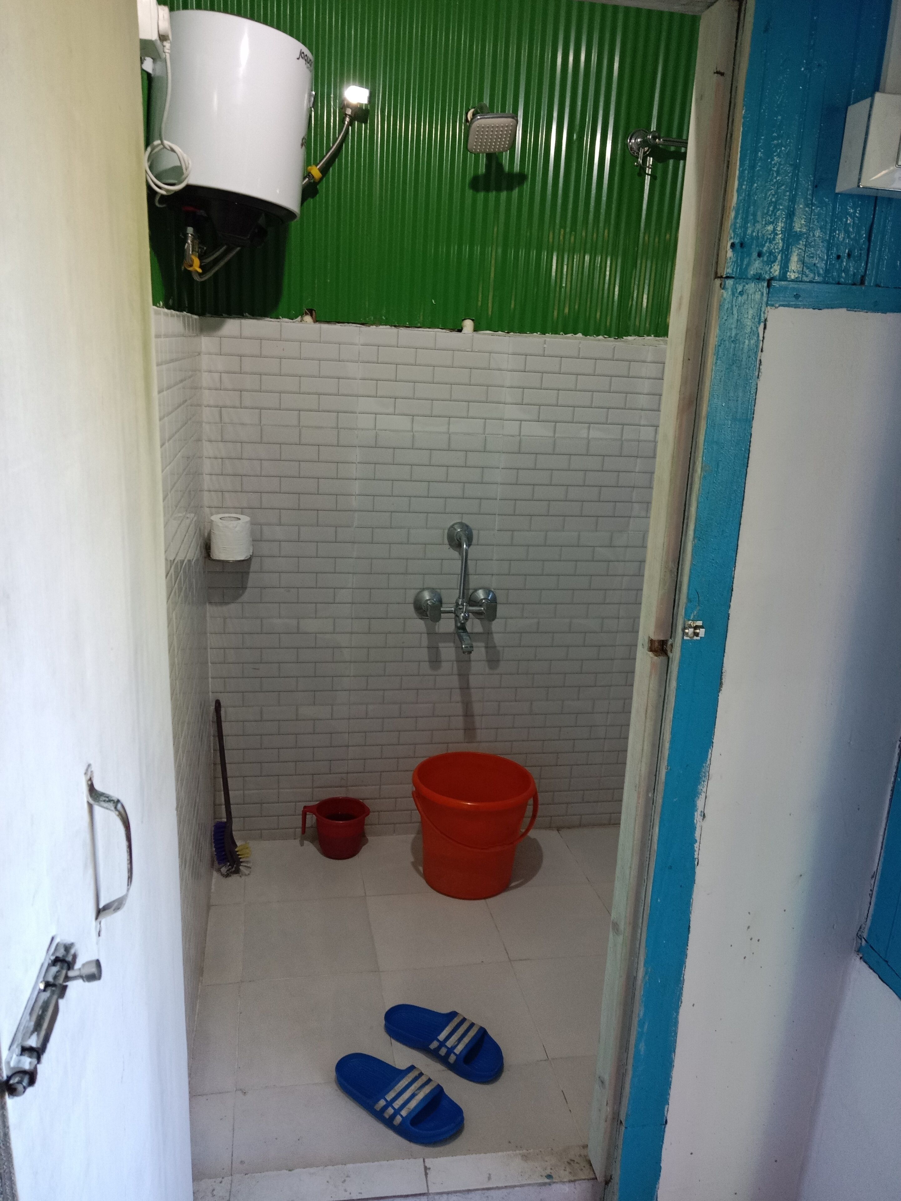 Shower, towels, soap, toilet paper