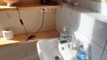 Hair dryer, towels, soap, shampoo