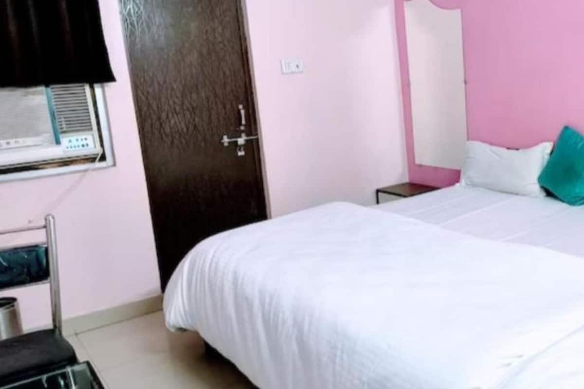 Quarto triplo luxo, vista para a cidade | Vista do quarto