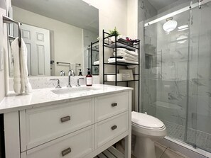 Hair dryer, towels, shampoo