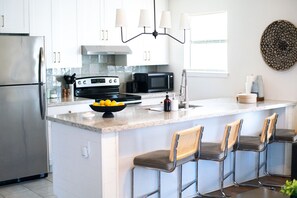 Fridge, microwave, oven, stovetop - 202, Ocean Side, Patio, Laundry, Desk (South Padre Island)