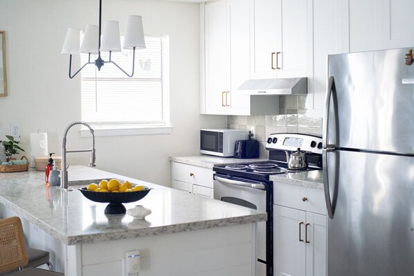 Fridge, microwave, oven, stovetop - 202, Ocean Side, Patio, Laundry, Desk (South Padre Island)