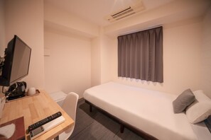 Quarto econômico | 1 quarto, escrivaninha, cortinas blackout, Wi-Fi de cortesia