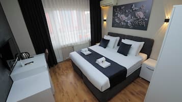 Premium bedding, minibar, desk, laptop workspace