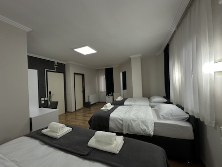 1 habitación, ropa de cama de alta calidad, minibar y escritorio
