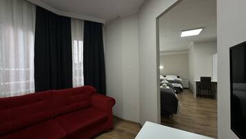 Standard Quadruple Room | Premium bedding, minibar, desk, laptop workspace