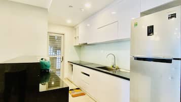 Standard Apartment | Private kitchen | Full-size fridge, microwave, stovetop, rice cooker