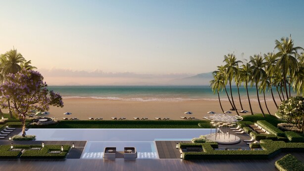 A resort with a pool, lounge chairs, and a view of the beach and ocean. - Roxy Beach Apartment (Lundu)