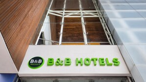 A B&B hotel sign with a modern design, featuring a logo and the name in bold letters. - B&B Hotel Olhao Algarve (Olhao)