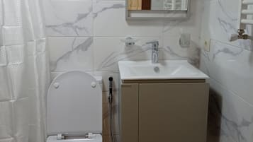 Hair dryer, towels, soap, shampoo