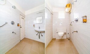 Un baño con inodoro, lavabo y ducha.