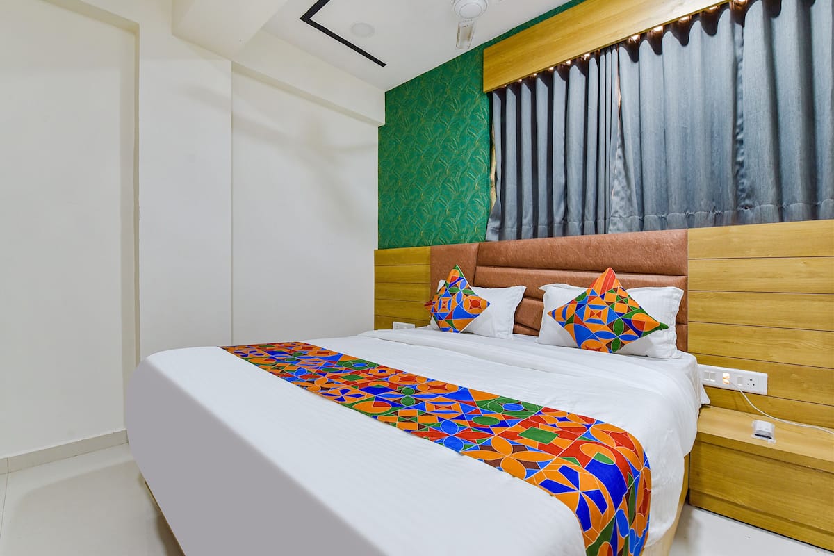 Deluxe kamer | Lakens van Egyptisch katoen, luxe beddengoed, een kluis op de kamer