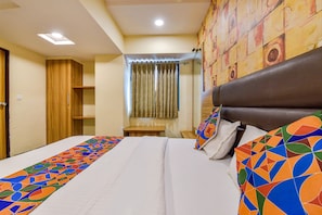 Egyptian cotton sheets, premium bedding, free WiFi, bed sheets - Fabhotel Vishala (Ahmedabad)