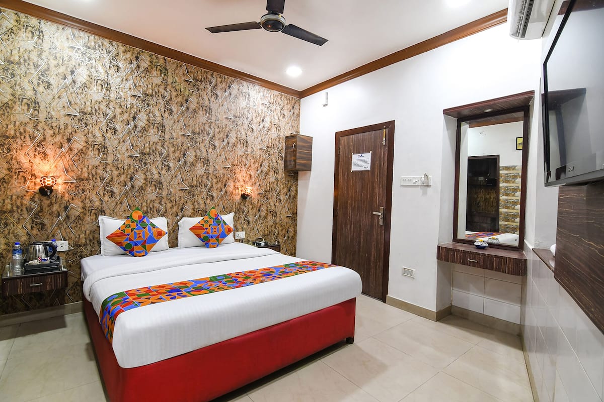 Habitación Deluxe | Sábanas de algodón egipcio, ropa de cama de alta calidad, caja fuerte