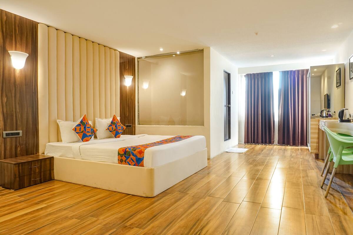 Deluxe kamer | Lakens van Egyptisch katoen, luxe beddengoed, een kluis op de kamer