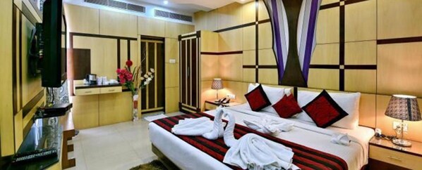 Deluxe Room | Egyptian cotton sheets, premium bedding, in-room safe - Fabhotel Prime Simna International (Muzaffarpur)