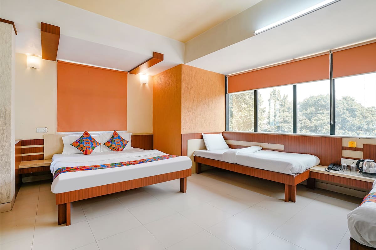 Deluxe kamer | Lakens van Egyptisch katoen, luxe beddengoed, een kluis op de kamer