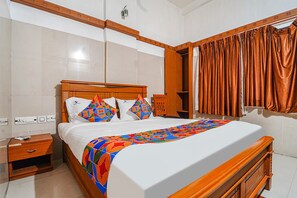 Egyptian cotton sheets, premium bedding, in-room safe, desk - FabHotel Sca (Coimbatore)
