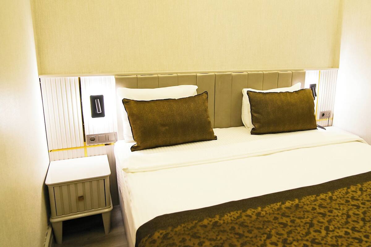 Economy Room (Ground Floor) | Minibar, in-room safe, desk, laptop workspace