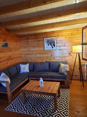 Suite Deluxe | Área de sala de estar