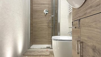 Classic Apartment | Bathroom | Shower, hair dryer, bidet, towels