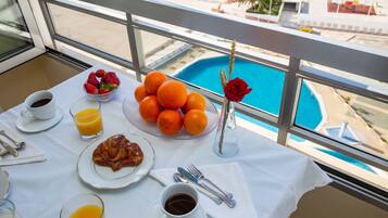 Panoramic Apartment | Living area | 42-inch LCD TV with cable channels