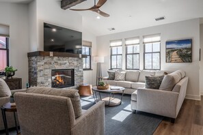 Smart TV, fireplace, table football, books
