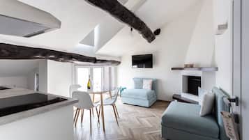 Comfort Apartment | Living area | Flat-screen TV