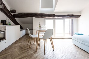 Comfort Apartment | Living area | Flat-screen TV