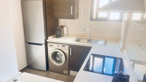 Fridge, microwave, oven, coffee/tea maker