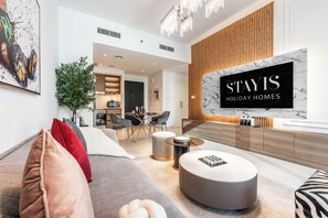 Apartamento luxo | Área de estar | Smart TV 64 polegadas com canais digitais