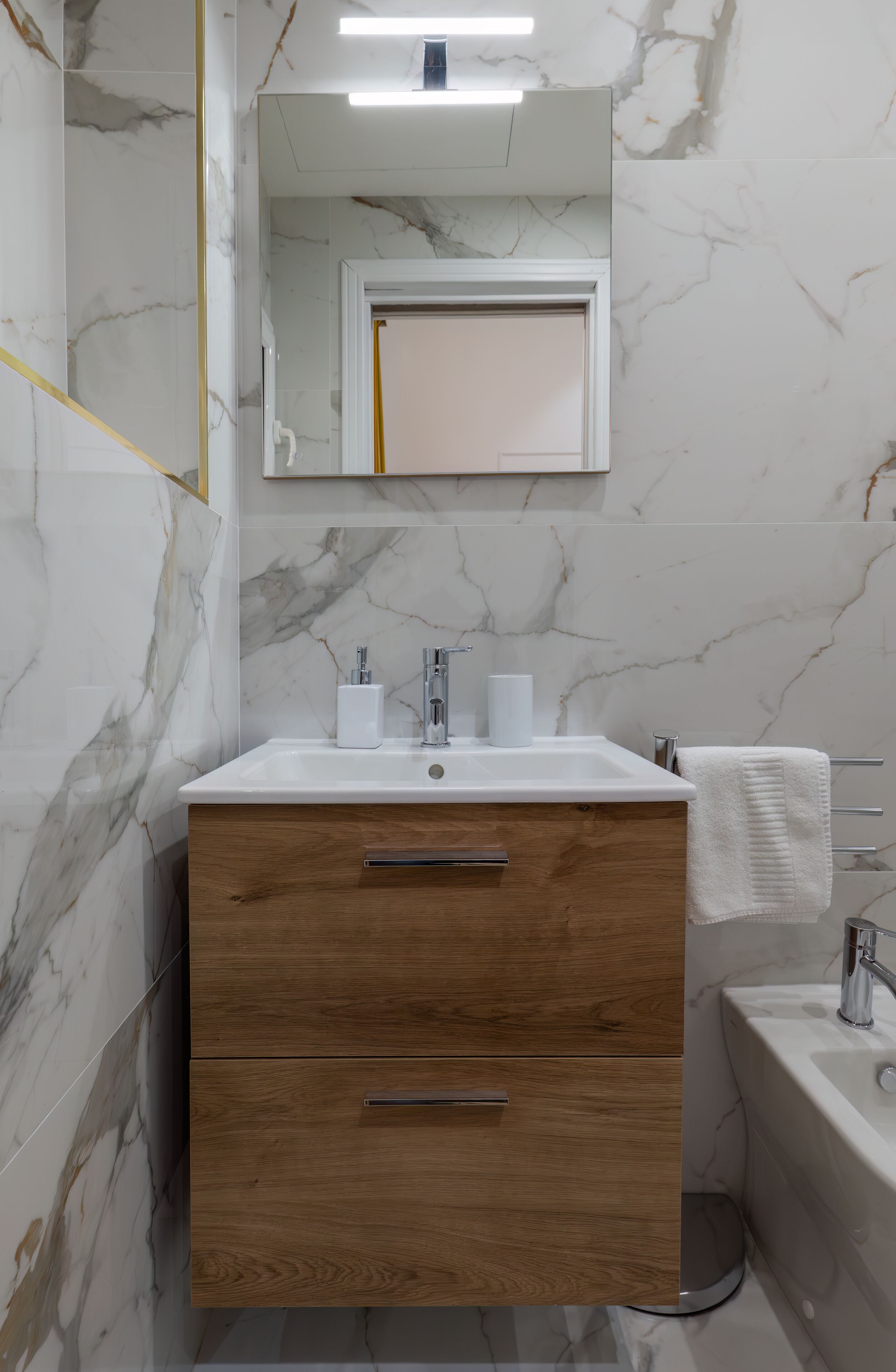 Quarto standard | Banheiro | Chuveiro, secador de cabelo, bidê, toalhas de banho