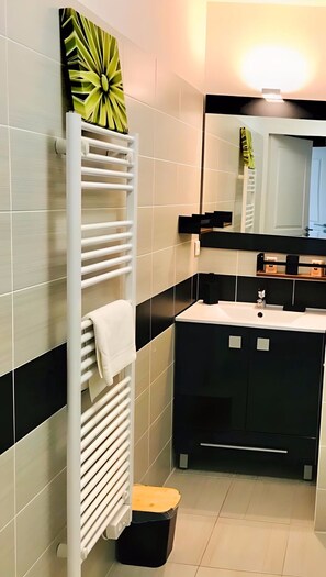 Hair dryer, towels, soap, shampoo