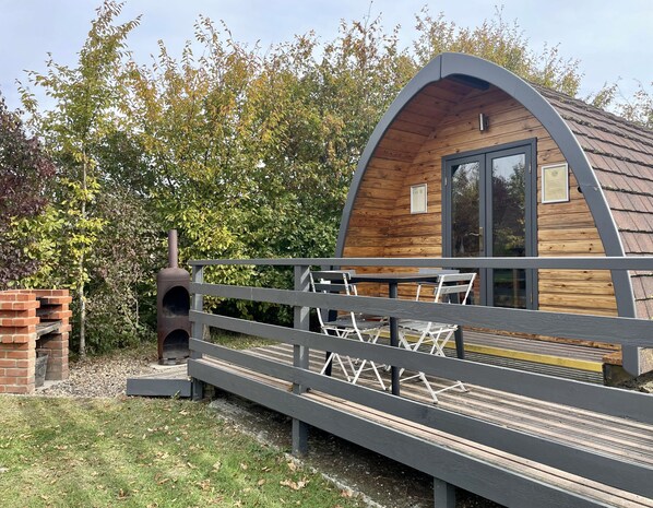 Outdoor dining - MegaPod 3 at Lee Wick Farm Glamping (Clacton on Sea)