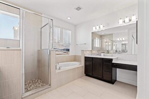 Shower, hair dryer, towels, shampoo