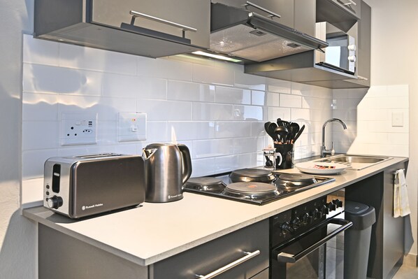 Standard Apartment, 2 Bedrooms | Private kitchen | Full-size fridge, microwave, oven, stovetop