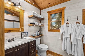 Shower, hair dryer, towels, shampoo