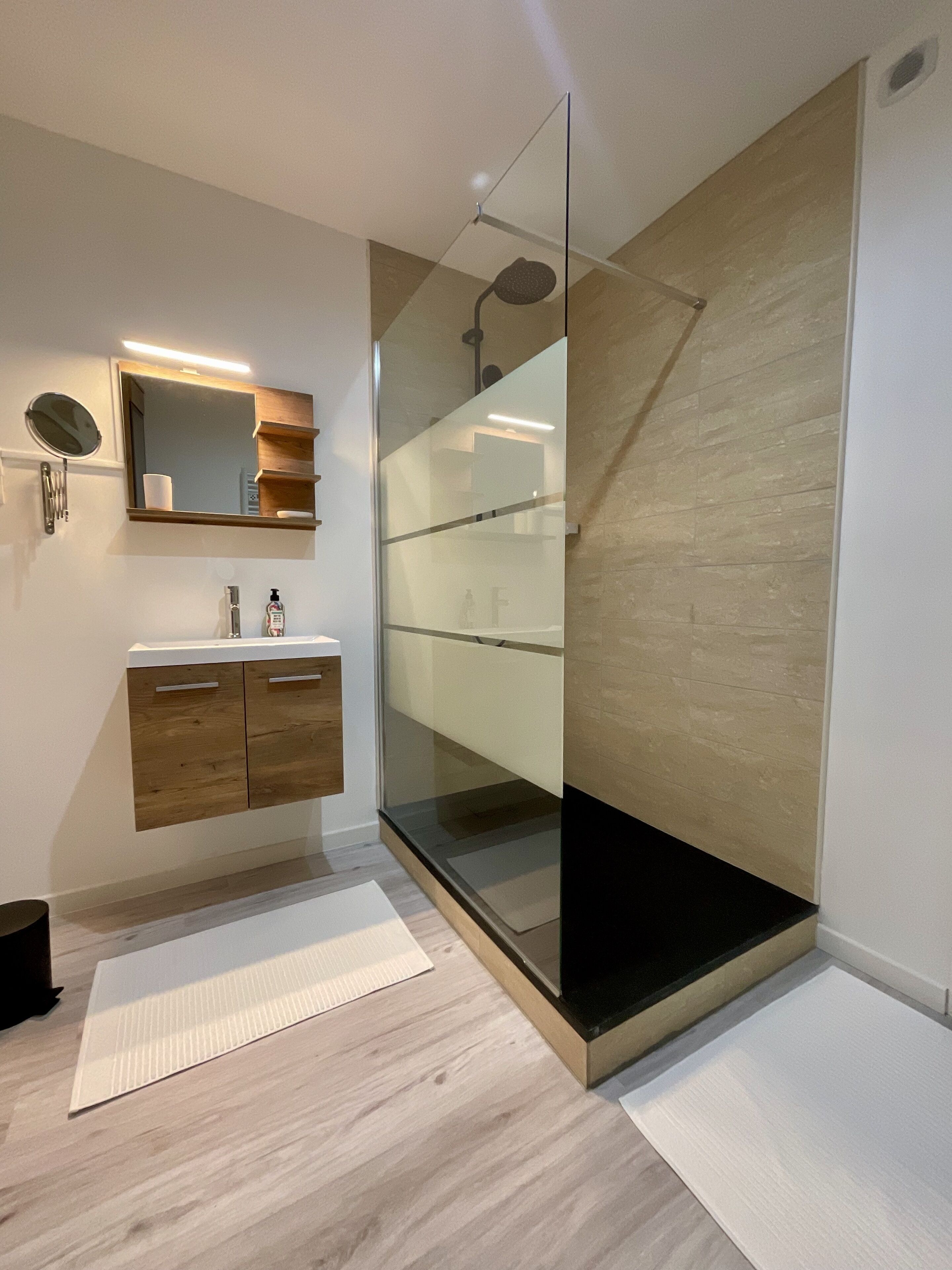 Shower, hair dryer, towels, toilet paper