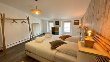 3 habitaciones, tabla de planchar con plancha y cuna de viaje