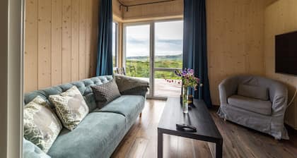 G-42 two-bedroom condo with a beautiful view of a natural environment.