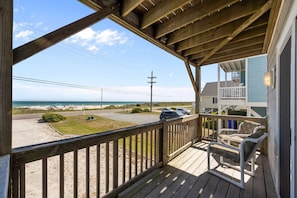 A wooden deck with a view of the beach and ocean. - A Merry Mermaid - 3BR Townhouse on Topsail Island with Ocean and Sound Views (North Topsail Beach)